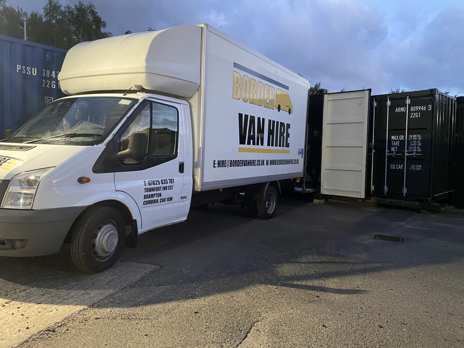 A large van at a self storage container unit
